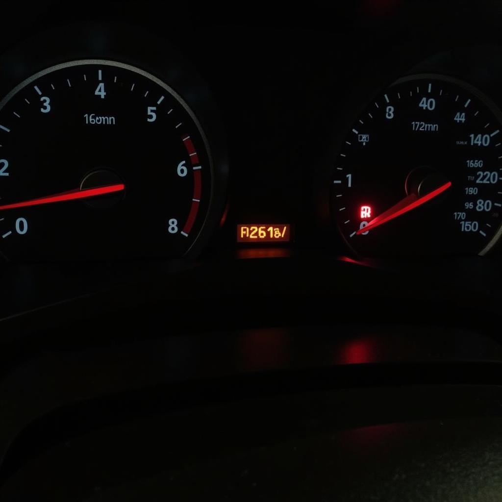 2014 Chevy Malibu dashboard with illuminated brake warning light