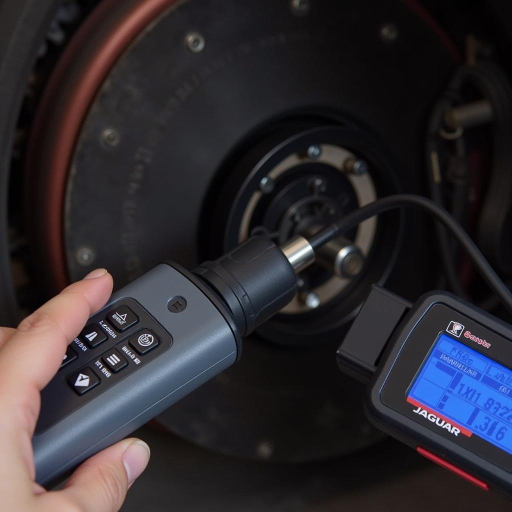 Mechanic Resetting Jaguar Brake Pad Warning Light