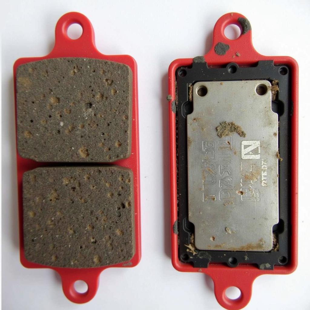 Worn Can-Am Brake Pads